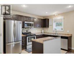 Living room - 413 X Avenue S, Saskatoon, SK S7M3H7 Photo 10