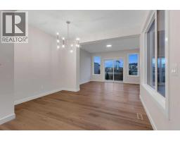Family room - 394 South Shore Drive, Chestermere, AB T1X2Y6 Photo 11
