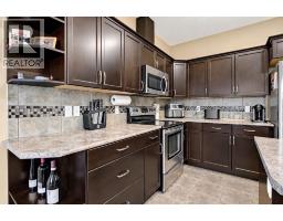 Family room - 8910 94 Avenue, Grande Prairie, AB T8X0M3 Photo 6