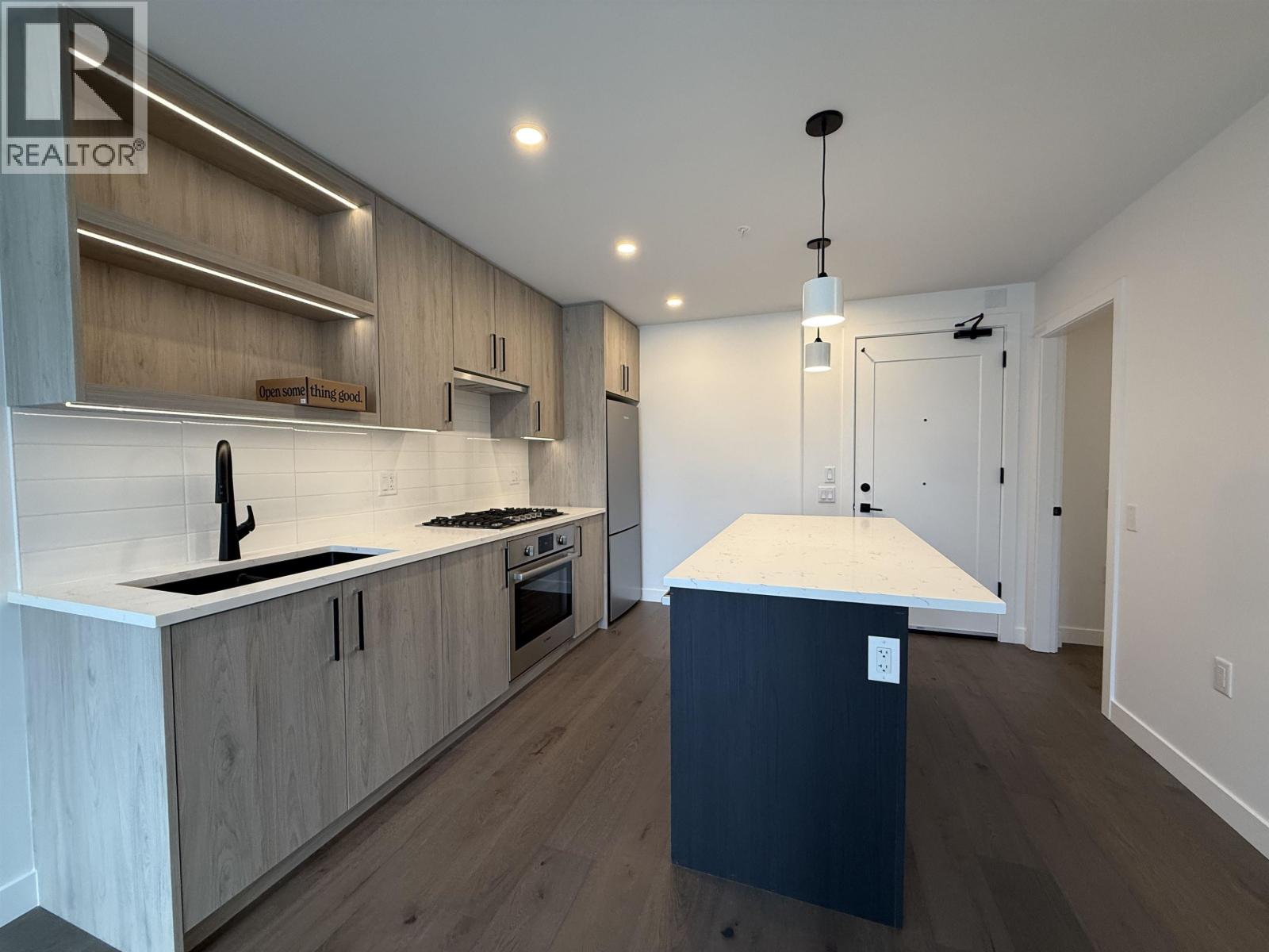 6859 CAMBIE Unit 208 photo 5