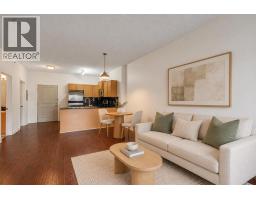 Living room - 3616, 11811 Lake Fraser Drive Se, Calgary, AB T2J7J4 Photo 6