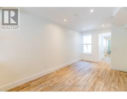 Bedroom 3 - Main - 129 Kenilworth Avenue, Toronto, ON M4L3S7 Photo 6