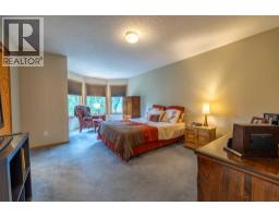 Bedroom - 19 Mckenzie Lake Manor Se, Calgary, AB T2Z1Y4 Photo 15