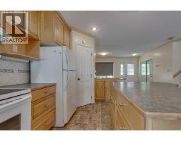 Family room - 82 Ruttan Close, Red Deer, AB T4P3T2 Photo 10
