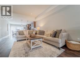 Living room/Fireplace - 11931 Maitland Avenue, Windsor, ON N8P0B9 Photo 7