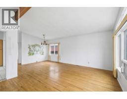 Family room - 132 Lake Wapta Rise Se, Calgary, AB T2J2M9 Photo 9
