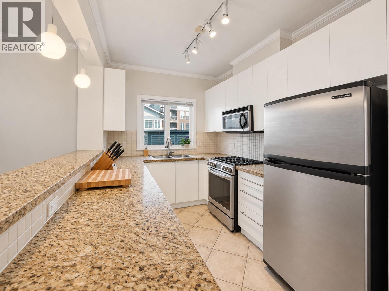 Photo of 107 4211 BAYVIEW STREET 14
