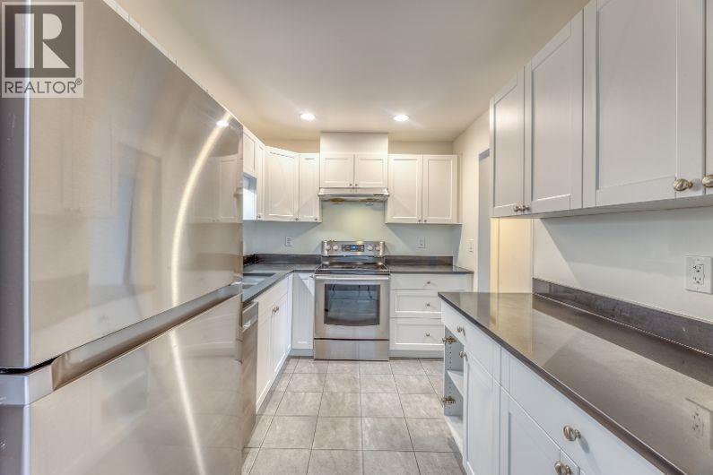 210 2915 GLEN DRIVE, Coquitlam - Image 1