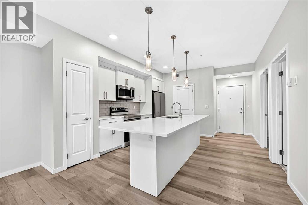 325, 360 Harvest Hills Way NE photo 2
