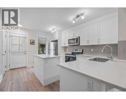 Family room - 110, 338 Seton Circle Se, Calgary, AB T3M3H1 Photo 11