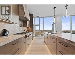 Laundry room - 4104, 530 3 Street Se, Calgary, AB T2G2L8 Photo 11
