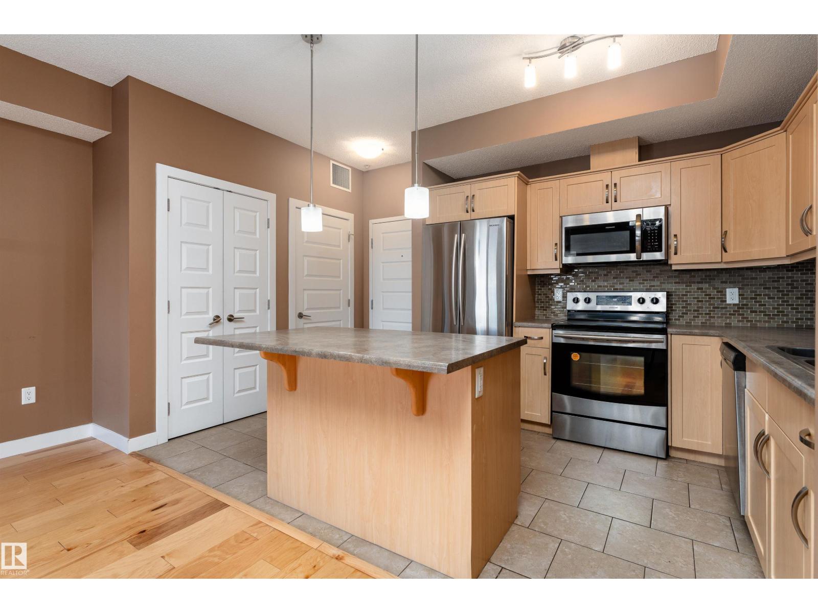 #210 8730 82 AV NW - 23