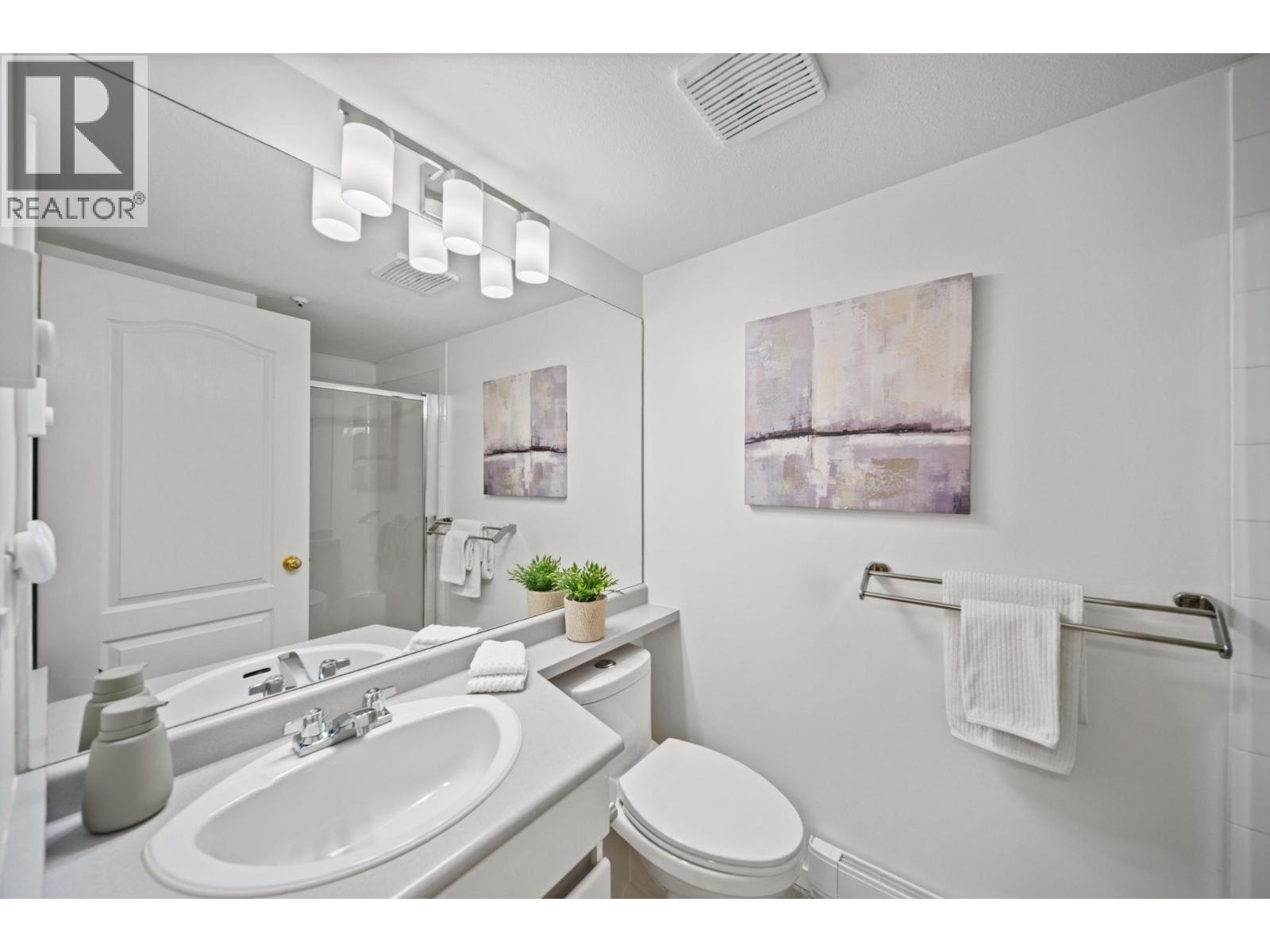 Photo of 302 6745 STATION HILL COURT 21