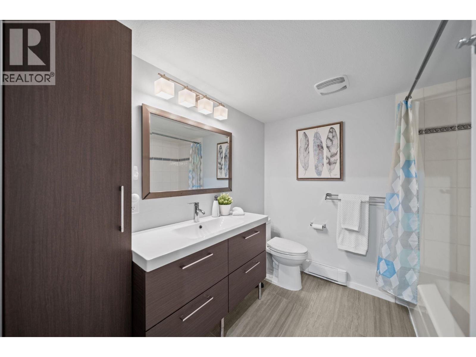 Photo of 302 6745 STATION HILL COURT 19