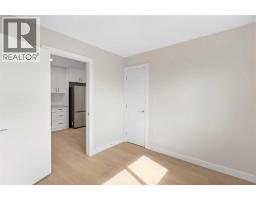 Living room - 907 / 909 16 Street Ne, Calgary, AB T2E4S7 Photo 12