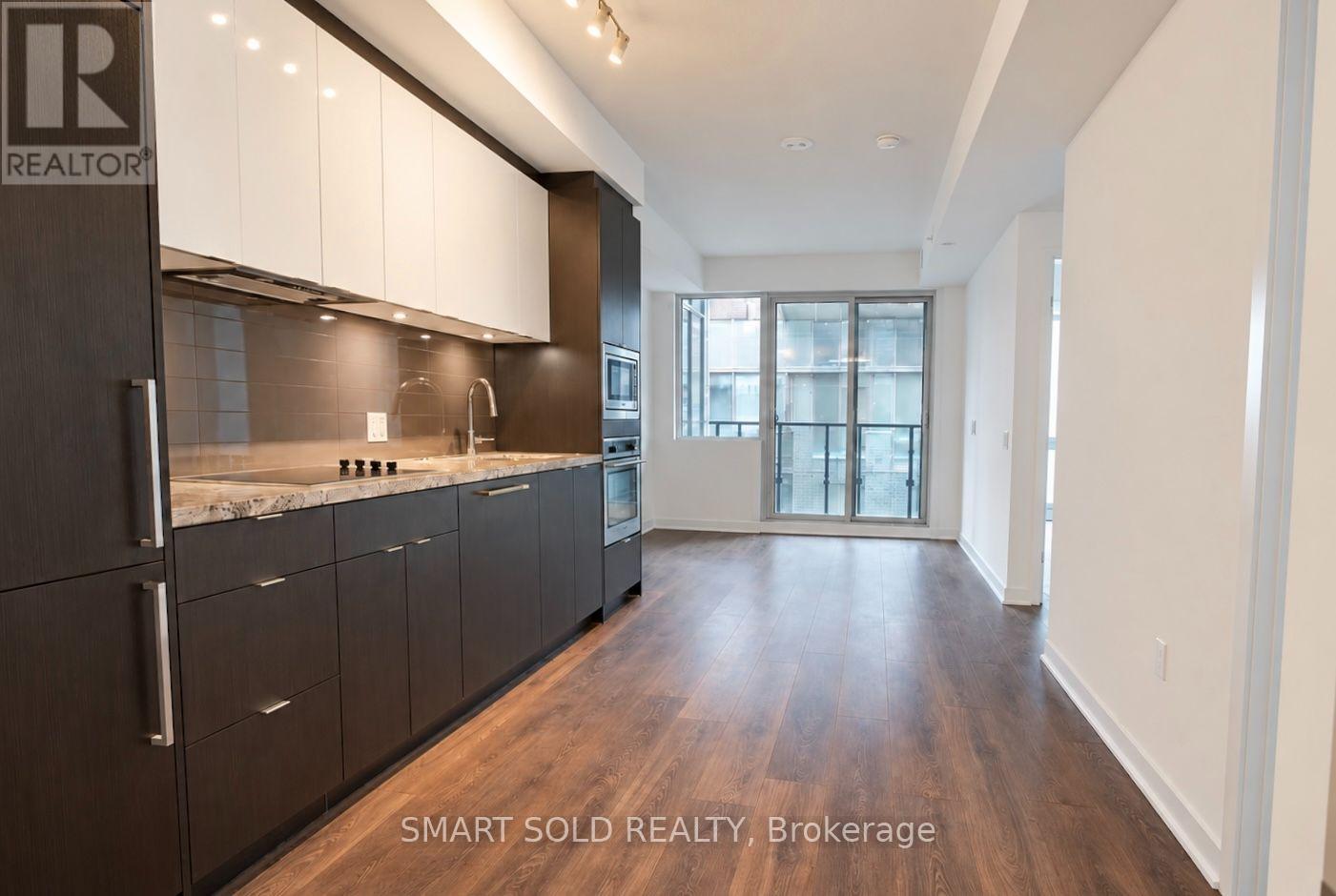 907 - 115 BLUE JAYS WAY, Toronto (Waterfront Communities) — photo 2