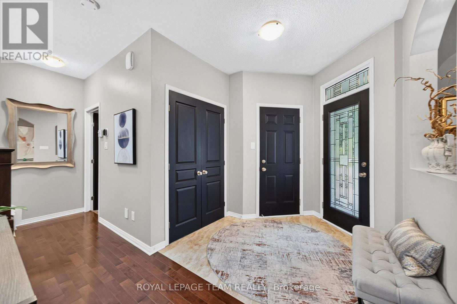 Entry way with closet space and glass entry door