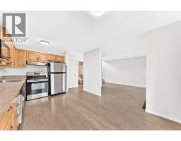 Family room - 4, 2323 Oakmoor Drive Sw, Calgary, AB T2V4T2 Photo 8