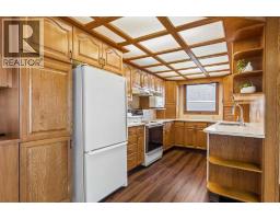 Den - 440 Lynnover Way Se, Calgary, AB T2C1L1 Photo 6