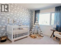 Bedroom - 71 Heritage Heath, Cochrane, AB T4C0L3 Photo 11