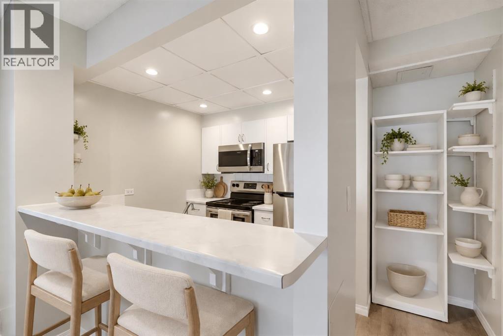 #102 1414 12 Street SW - 1