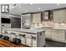 Kitchen - 404, 105 Stewart Creek Rise Sw, Canmore, AB T1W0J5 Photo 10