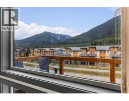 Bedroom - 404, 105 Stewart Creek Rise Sw, Canmore, AB T1W0J5 Photo 8