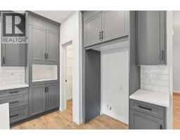 Laundry room - 95 Dawson Wharf Mount, Chestermere, AB T1X2X5 Photo 13