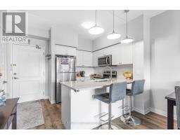 409 - 610 Farmstead Drive, Milton, ON L9T8X5 Photo 12