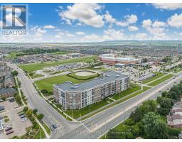 409 - 610 Farmstead Drive, Milton, ON L9T8X5 Photo 34
