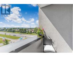 409 - 610 Farmstead Drive, Milton, ON L9T8X5 Photo 25