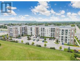 409 - 610 Farmstead Drive, Milton, ON L9T8X5 Photo 31