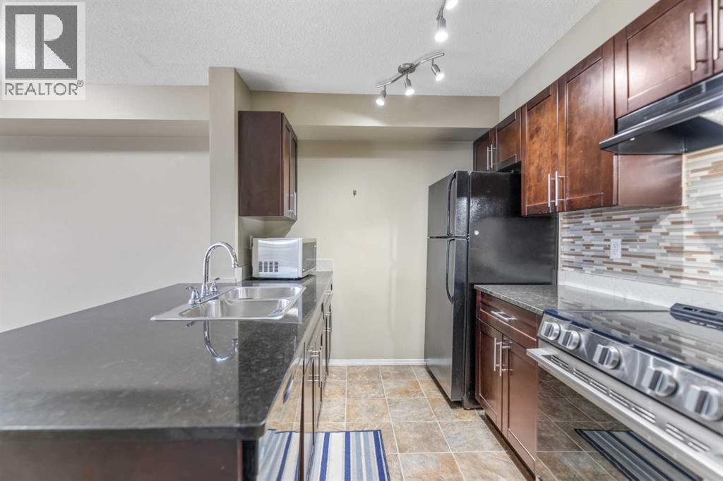 #210 15 Saddlestone Way NE - 19