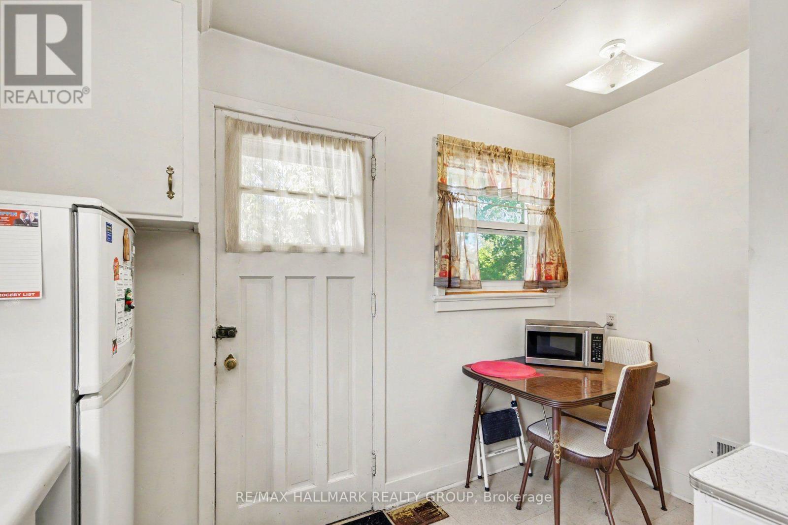 Eating area with side door to yard