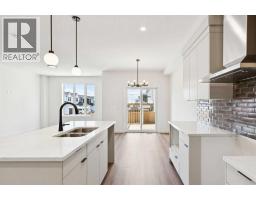 Laundry room - 89 Heritage Park, Cochrane, AB T4C3N1 Photo 13