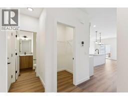 Laundry room - 69 Heritage Park, Cochrane, AB T4C3M8 Photo 13