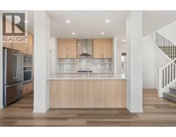 Laundry room - 222 Knight Avenue, Crossfield, AB T0M0S0 Photo 11