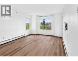 Kitchen - 2410, 60 Panatella Street Nw, Calgary, AB T3K0M2 Photo 7