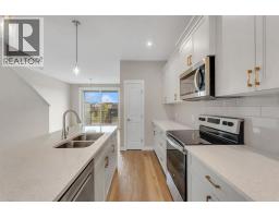 Primary Bedroom - 164 Rowmont Boulevard Nw, Calgary, AB T3L0H3 Photo 10