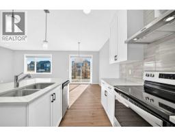 Primary Bedroom - 122 Belmont Crescent Sw, Calgary, AB T2X4N7 Photo 10