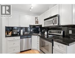 305, 716 3 Avenue NW - photo 3