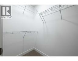 Laundry room - 24 Tillotson Loop, Okotoks, AB T1S4S8 Photo 11