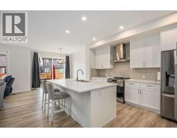 Family room - 201 Creekstone Path Sw, Calgary, AB T2X4Z4 Photo 7