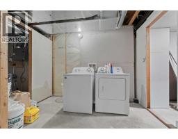 111 Wolf Creek Manor Se, Calgary, AB T2X4A1 Photo 37
