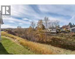 210, 102 Centre Court, Okotoks, AB T1S1Z7 Photo 35