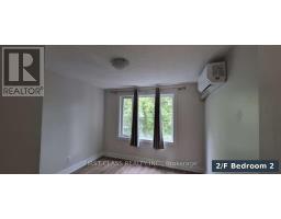 Living room - 301 Rhodes Avenue, Toronto, ON M4L3A4 Photo 11
