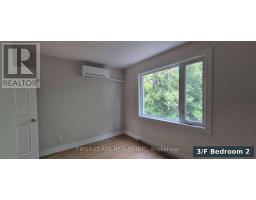 Living room - 301 Rhodes Avenue, Toronto, ON M4L3A4 Photo 15