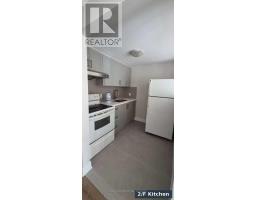 Living room - 301 Rhodes Avenue, Toronto, ON M4L3A4 Photo 9