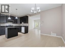 Family room - 335 Willowgrove Lane, Saskatoon, SK S7K1N3 Photo 11