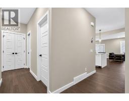 66 Belmont Manor SW, Calgary — photo 2